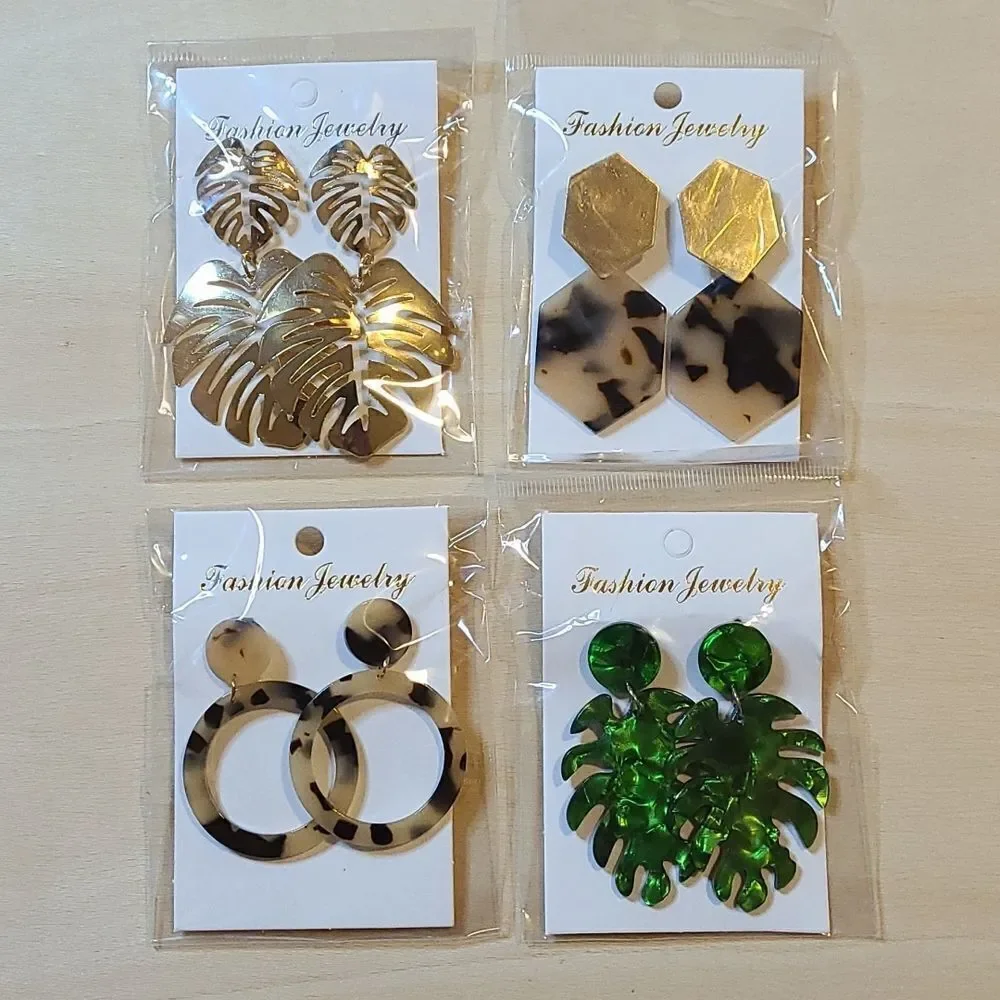 Fashion Jewelry 4 pairs of acrylic gold plated earrings.